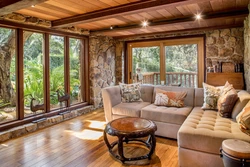 Modern living room in a wooden house photo