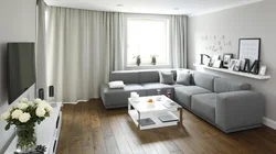 Interior Of A Living Room In A Modern Style Apartment With A Corner Sofa