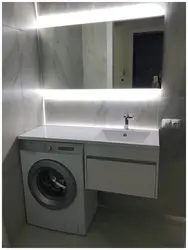 Machine under the countertop bathtub photo
