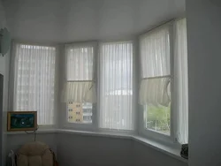 Curtains on the loggia in the interior photo