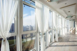 Curtains on the loggia in the interior photo