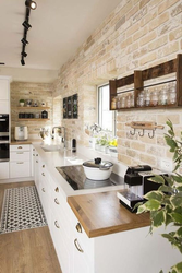 Kitchen design with bricks on the wall photo