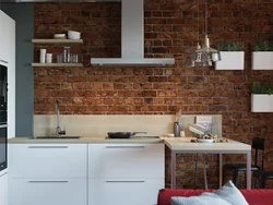 Kitchen design with bricks on the wall photo