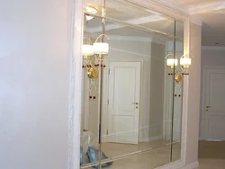 Mirror in the hallway on the entire wall interior