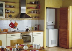 Kitchen With Corner Stove And Gas Water Heater Photo