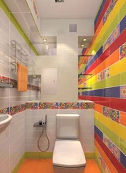 Bathroom interior with colored tiles