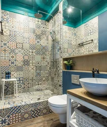 Bathroom interior with colored tiles