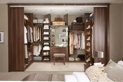 Bedroom design with a full-wall walk-in closet