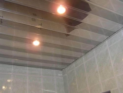 Plastic on the ceiling in the bathroom photo