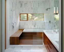 Bathroom interior with marble and wood tiles