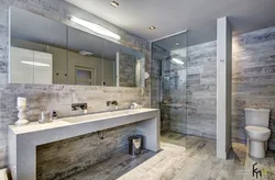 Bathroom interior with marble and wood tiles