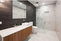 Bathroom interior with marble and wood tiles