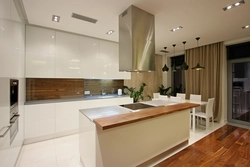 Island in the kitchen photo in a modern apartment