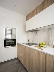 Modern white kitchen with wood in the interior