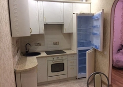 Kitchen design 6m2 in Khrushchev with refrigerator and gas