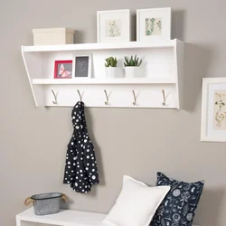 Wall shelves in the hallway in the interior