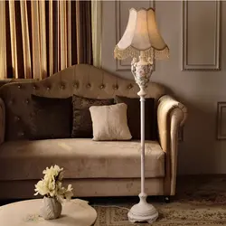 Floor lamps in the living room interior photo