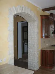Stone arch in the apartment photo