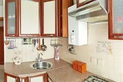 Kitchen design 6 meters with geyser and refrigerator