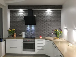 Kitchen Interior With Bricks On The Wall