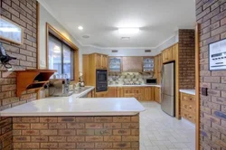 Kitchen interior with bricks on the wall