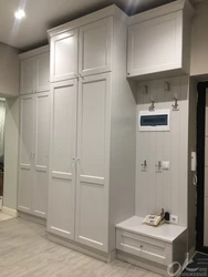Hallway with white furniture design photo