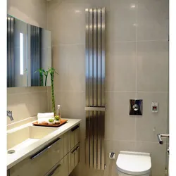 Heated Towel Rail In The Bathroom Interior