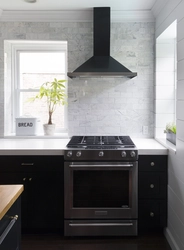 Kitchen renovation photo with gas stove