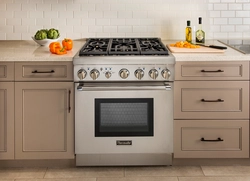 Kitchen renovation photo with gas stove