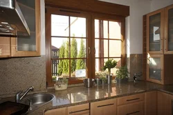 Window design in the kitchen in the apartment decoration