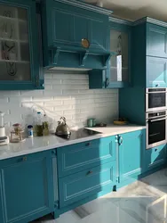 Light turquoise kitchen in the interior