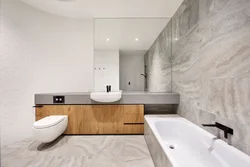 Bath Design With Marble Tiles And Wood