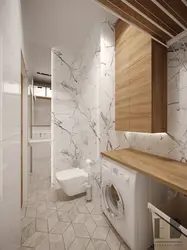 Bath Design With Marble Tiles And Wood