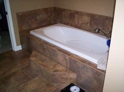 Tiling the bathtub photo