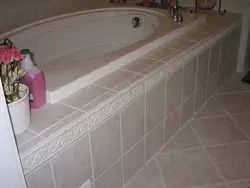 Tiling the bathtub photo