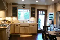 Kitchen design in a country house with access to the terrace