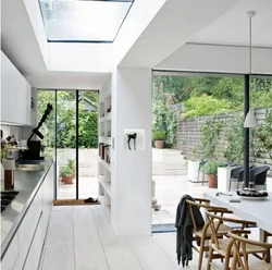 Kitchen design in a country house with access to the terrace