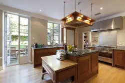 Kitchen design in a country house with access to the terrace