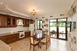 Kitchen design in a country house with access to the terrace