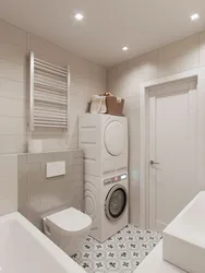 Bathroom interior with small bathtub and washing machine