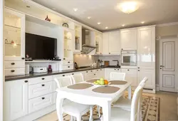Photo Of A Kitchen With A TV Set