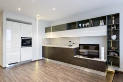 Photo of a kitchen with a TV set