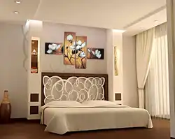 Wall decor above the bed in the bedroom photo