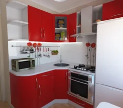 Photo of a small corner kitchen with appliances