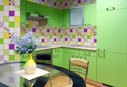 Green kitchen with wood kitchen interior