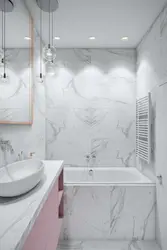 Small bathroom in marble tiles photo