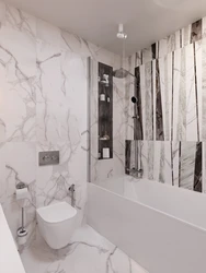 Small bathroom in marble tiles photo