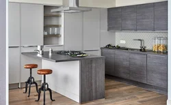 Light gray kitchen with wooden countertop photo