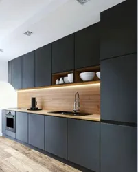 Light gray kitchen with wooden countertop photo