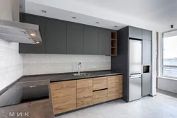 Light gray kitchen with wooden countertop photo